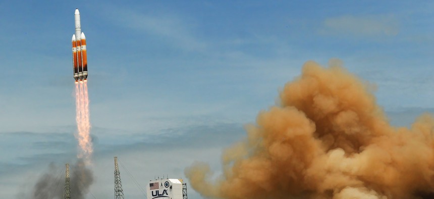 In this April photo, a United Launch Alliance (ULA) Delta IV Heavy rocket launches from Cape Canaveral Space Force Station carrying a classified spy satellite for the National Reconnaissance Office (NRO).