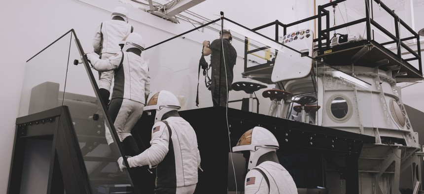 HAWTHORNE, CA - JUNE 11: SpaceX's Polaris Dawn mission, which is scheduled to launch no later than July 2024, is comprised of an all-private, commercial member astronaut mission. Polaris Dawn will be a human spaceflight to orbit Earth with only private citizens on board will spend up to five days in orbit and plan to complete a spacewalk. Here, the crew members train for their flight in a SpaceX training facility on June 11, 2024.
