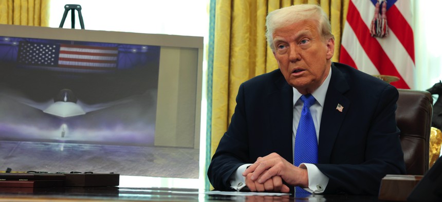 U.S. President Donald Trump delivers remarks in the Oval Office of the White House on March 21, 2025.